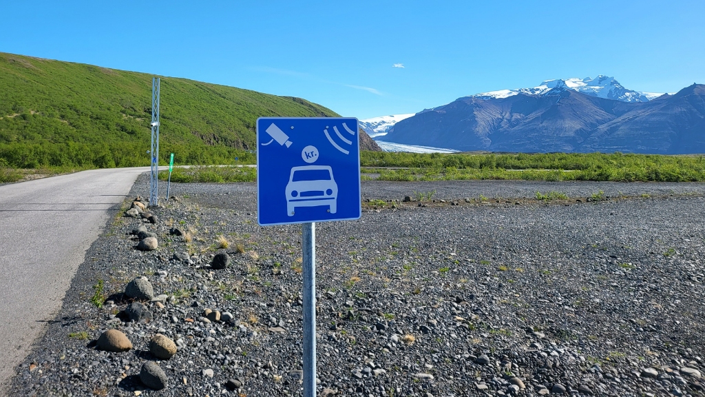 A sign by Skaftafell geo park indicating that you will be charged for parking. A sign by Skaftafell geo park indicating that you will be charged for parking.