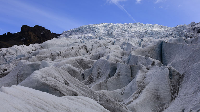 Falljökull Falljökull glacier resembles a waterfall cascading down the mountain.